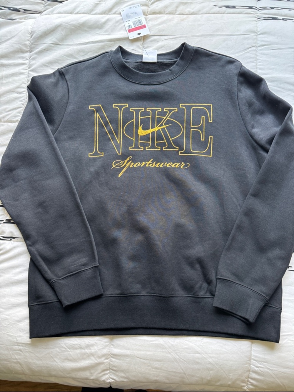 Nike Women’s Black Crewneck Sweatshirt with Gold Logo Script